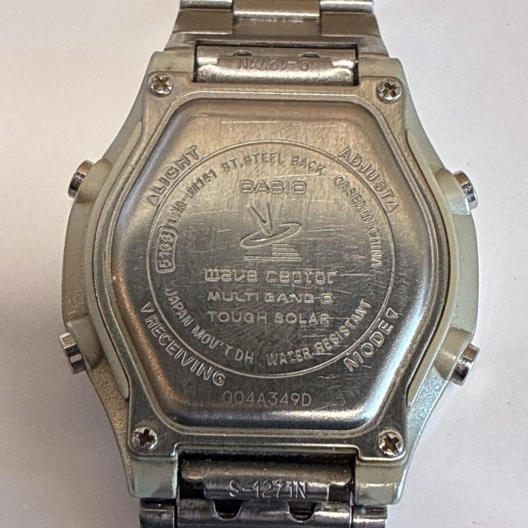 Beautiful, working condition CASIO ladies' watch, radio-controlled solar powered, with second hand and digital display.